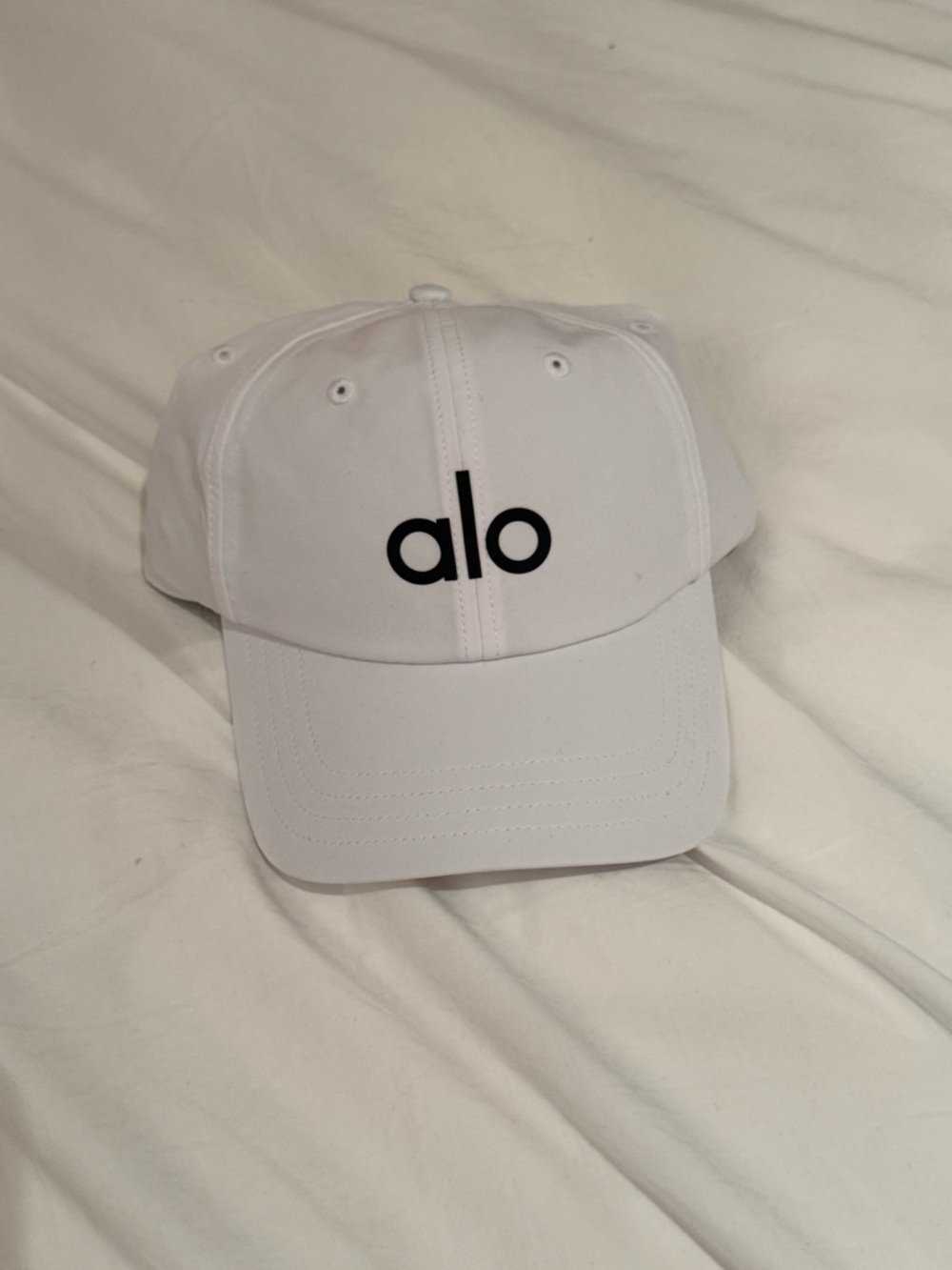 ALO Yoga White Cap with Black Logo